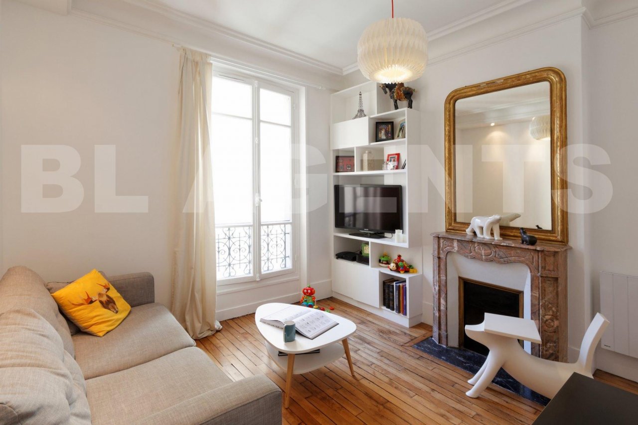 Agence-Avous-Appartement-Batignolles-cheminee-marbre-meuble-tv-sur-mesure